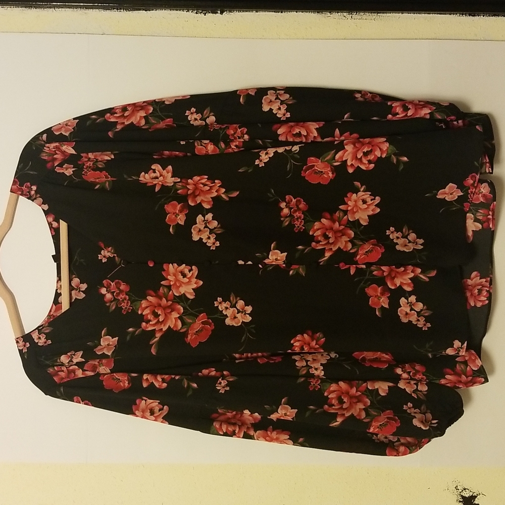 All over long sleeve floral tunic.